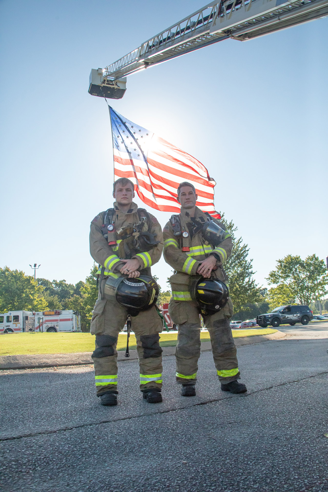 firefighters and flag